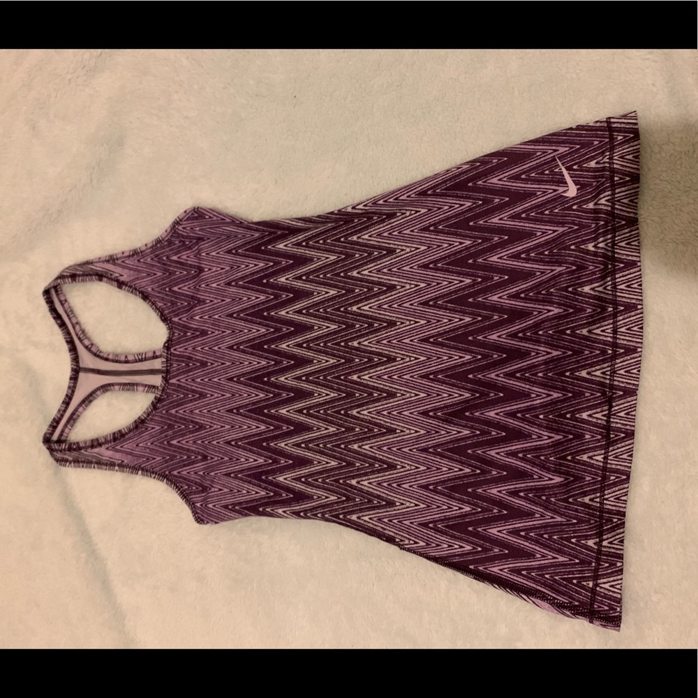A purple and white tang top from nike